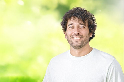 Smiling patient representing well-being and confidence with Fresubin Plant-Based medical nutrition.