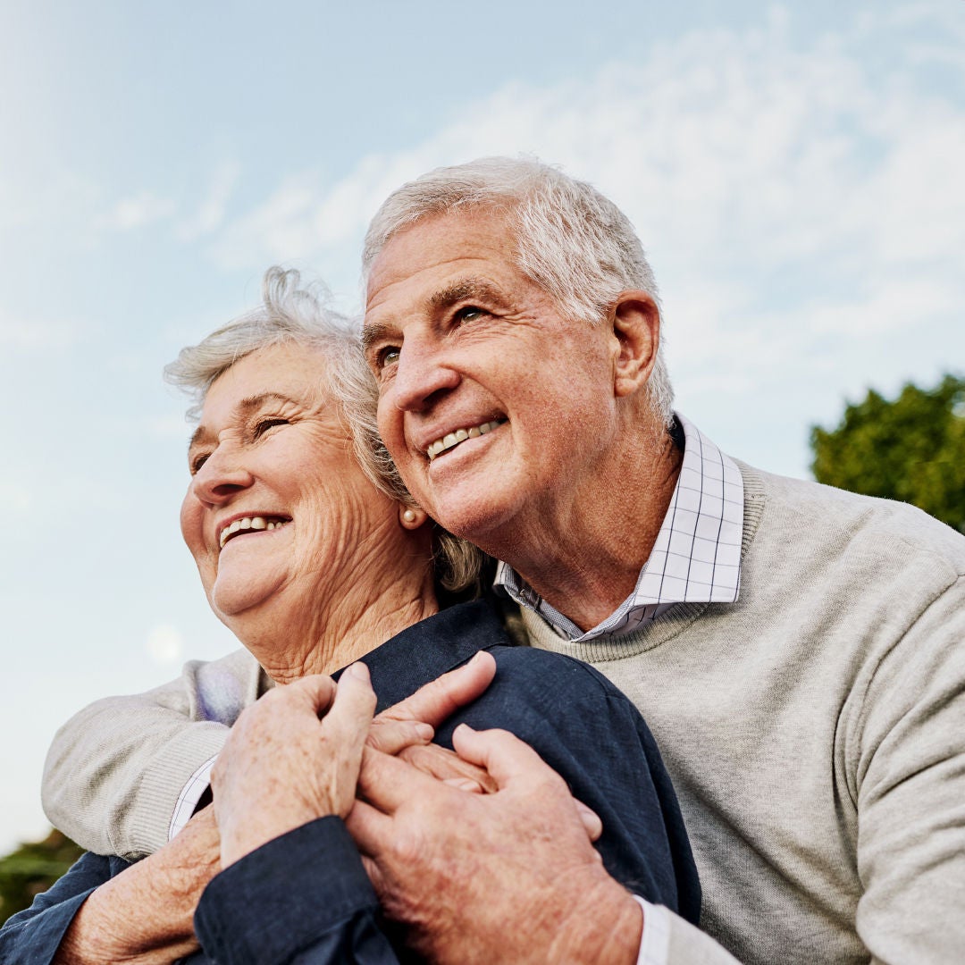 An older couple smile together knowing they are supported by Fresubin's nutritional supplement range, including Renalive for those with reduced kidney function. 