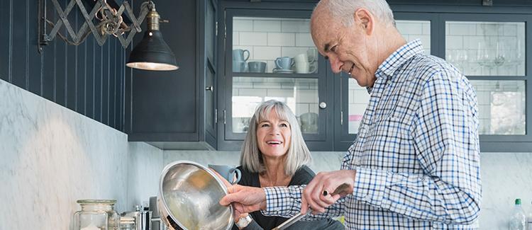 elderly couple in kitchen