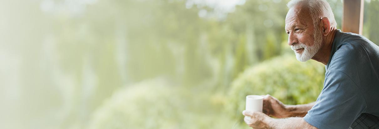 senior enjoying coffee in nature